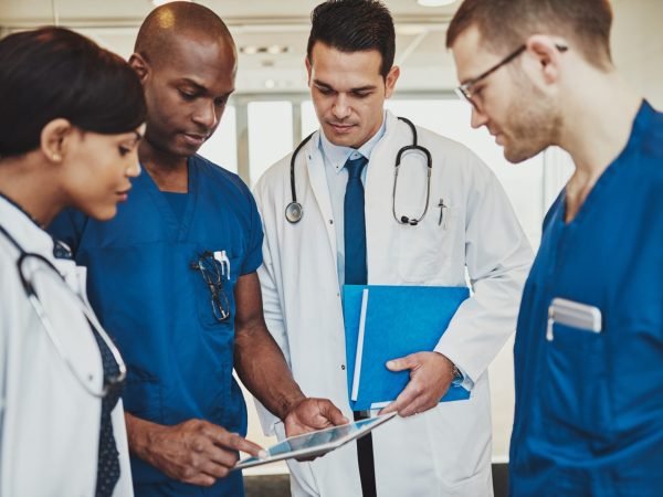 team-of-multiracial-doctors-at-hospital-e1598498378805.jpg